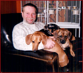 Ike with three dachshunds