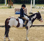 student rider on horseback